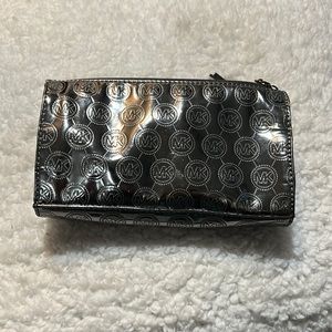 Silver metallic Michael Kors makeup/utility bag
